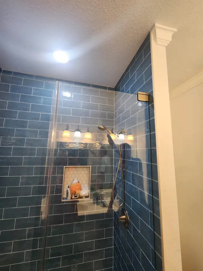 Blue glass subway shower