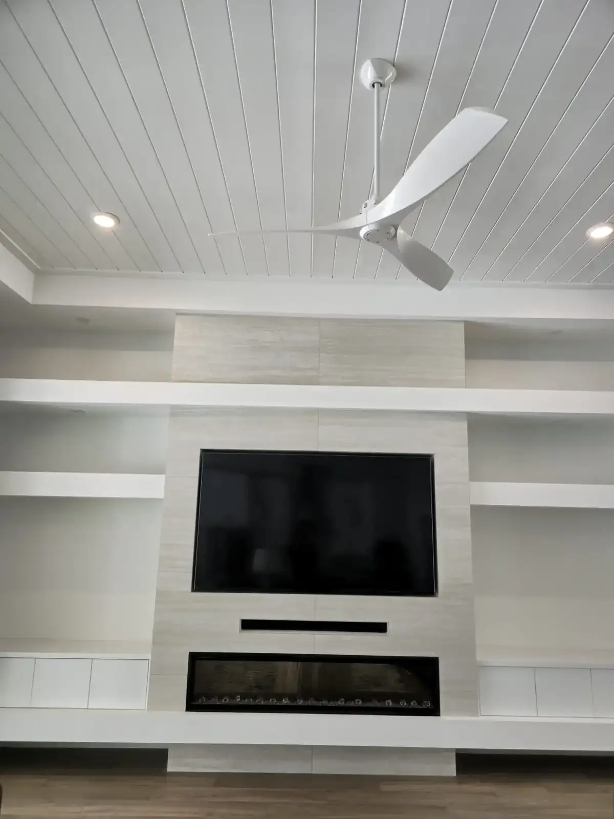 TV and fireplace wall in Estero