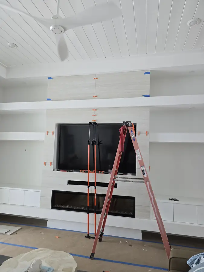 TV and fireplace wall, in progress